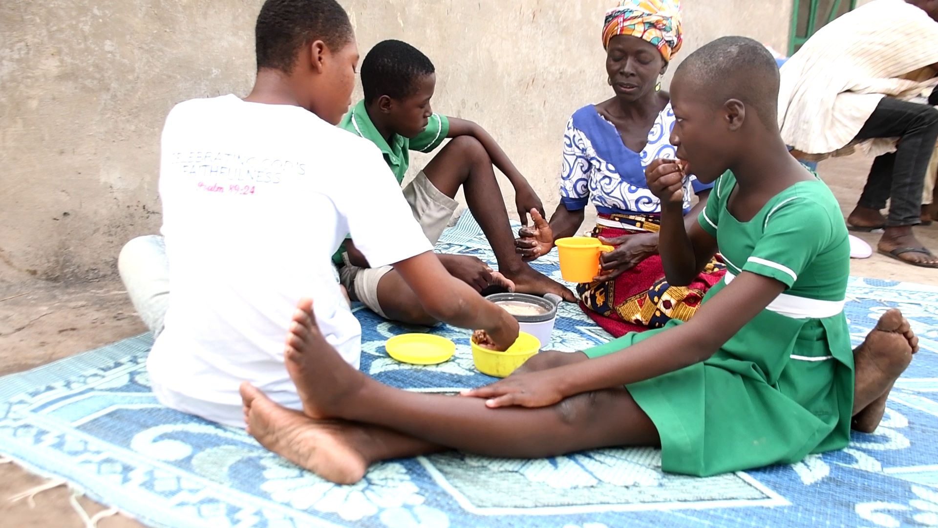 Ghanaian family eating