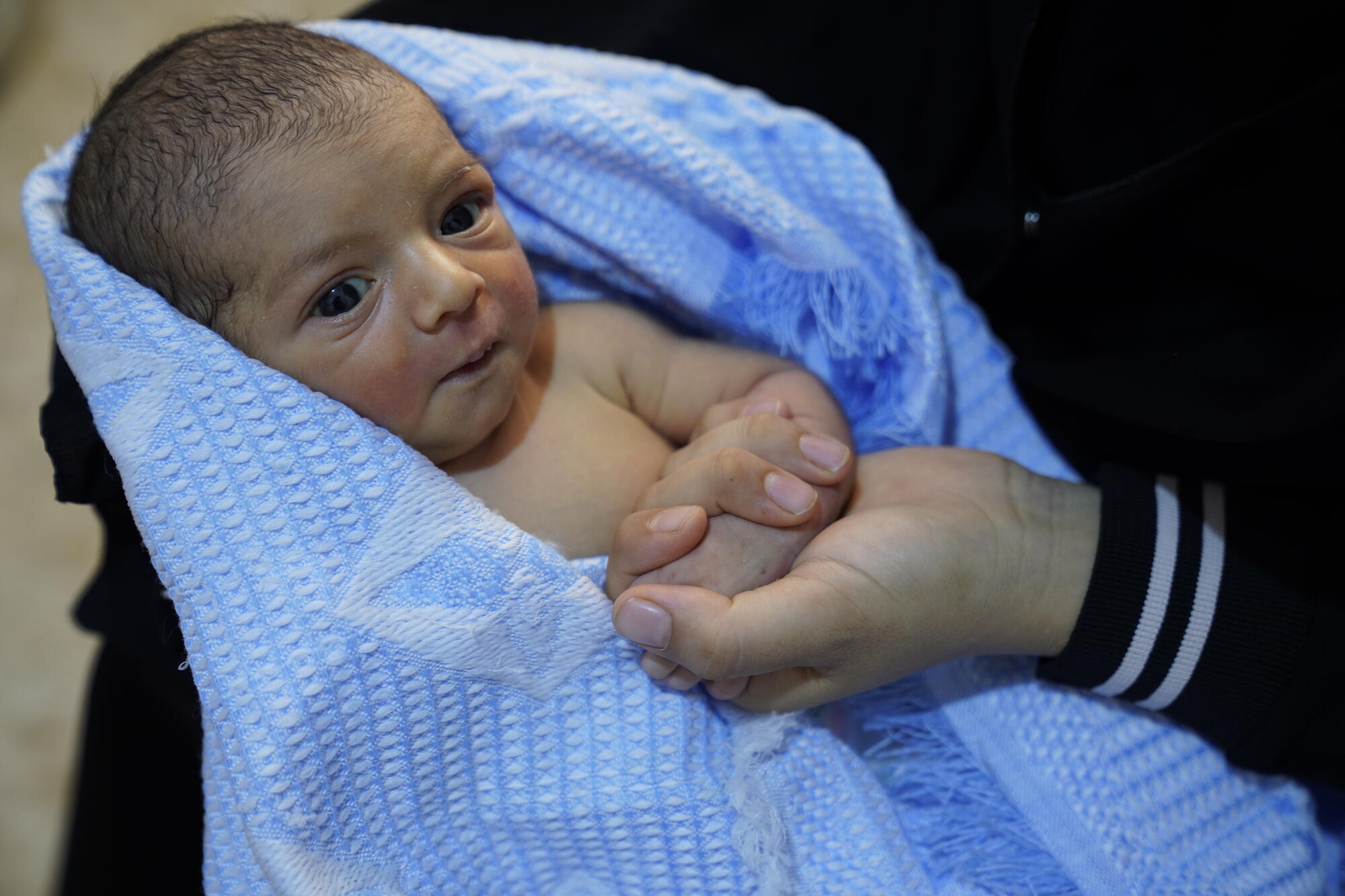 Baby wrapped in blanket