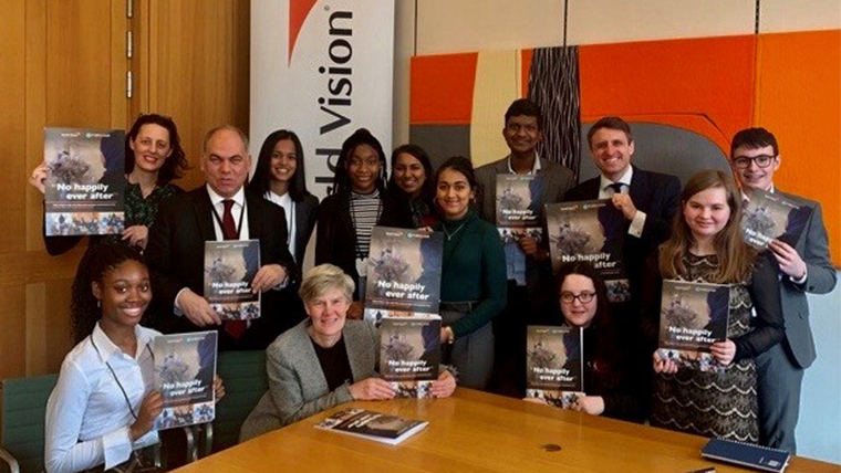 Asini, with our World Vision Youth Advocates and staff, presents the report 'No Happily Ever After' to MPs