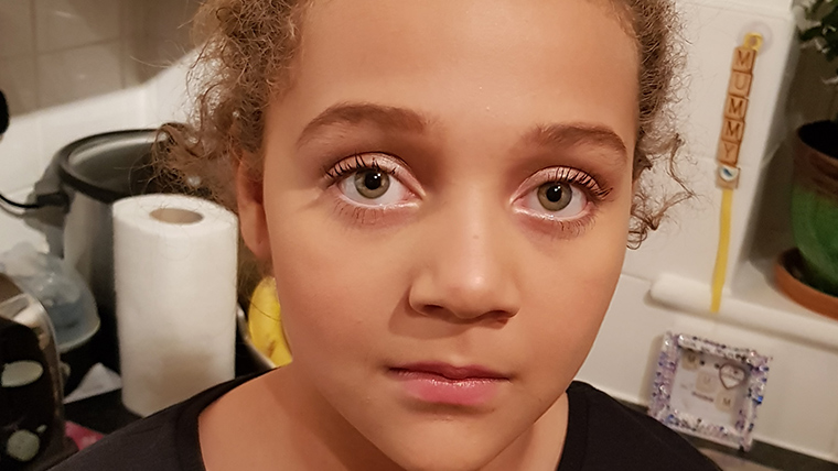 Young girl looking at the camera