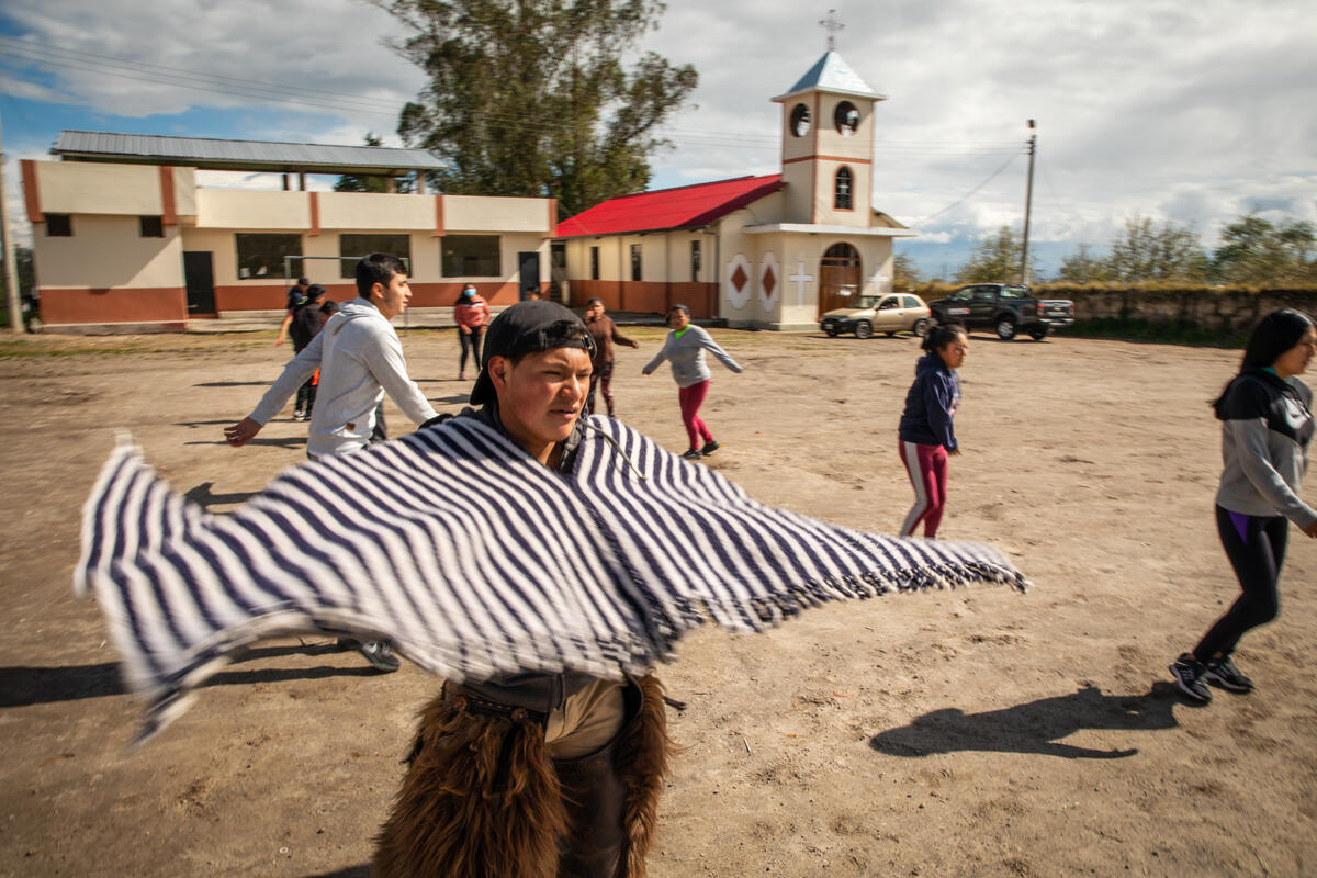 Young people practice a traditional dance together in Ecuador